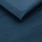 Blue upholstery fabric, textured for furniture, ideal for sofas and chairs.