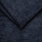 Dark blue textured fabric close-up, showcasing quality upholstery material.