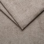 Beige textured fabric close-up, ideal for furniture upholstery or home decor.