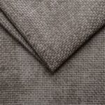 Close-up of textured grey upholstery fabric for furniture and home decor.