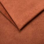 Soft brown velvet fabric with a smooth texture, ideal for upholstery, curtains, and home decor proje.