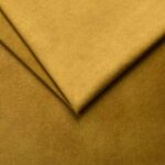 Soft mustard yellow fabric upholstery for furniture and home decor.