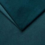 Luxurious teal velvet fabric suitable for upholstery and furniture projects.