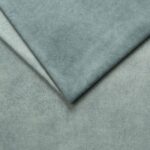 Close-up of soft grey upholstery fabric with a smooth texture.